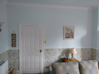 Living room couch lamp table 2 - a door and a window free wallpaper