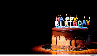 Chocolate birthday cake lit candles 4 - the dark room free wallpaper