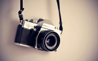 Camera hanging wall black strap 2 - photographic free wallpaper