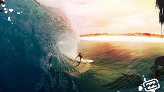 Man riding wave surfboard ocean 31 - a sky background and a caption free wallpaper for desktop