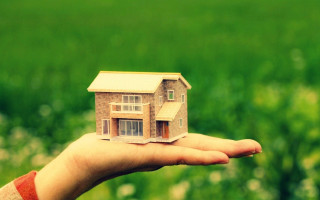 Person holding small house grass - a small house free wallpaper