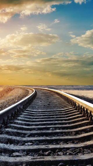 Train track sunset clouds mountain - precisionism free wallpaper