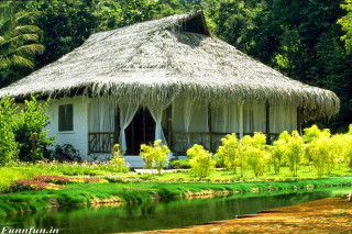 Thatched hut river bridge trees - a hut free wallpaper
