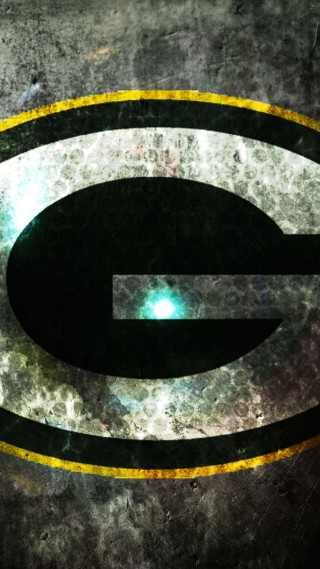 Green packers logo concrete yellow - a concrete surface free wallpaper for mobile