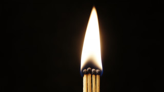 Matchstick lit dark flame between - a flame free wallpaper for desktop