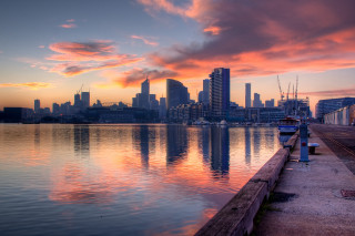 City skyline reflection sunset water - sky free wallpaper