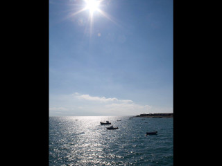 Boats floating water blue sky - free ship wallpaper for desktop