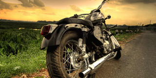 Motorcycle parked road field grass - cafer bater free wallpaper
