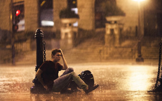 Man sitting ground rain hands - his foot free wallpaper