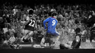 Soccer player sliding ground crowd 2 - a soccer player free wallpaper