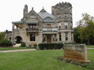 Large stone building castle inn - front view free wallpaper