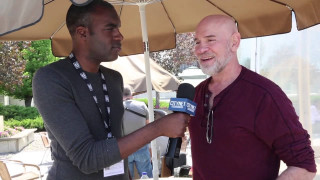 Man holding microphone talking under - david lazar free wallpaper for desktop