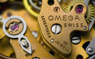 Omega swiss watch face gears - visible free wallpaper