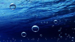 Blue ocean bubbles sky clouds - a blue ocean free wallpaper