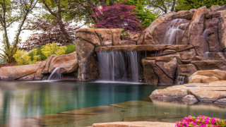 Waterfall pool rocks flowers garden - a garden area free wallpaper