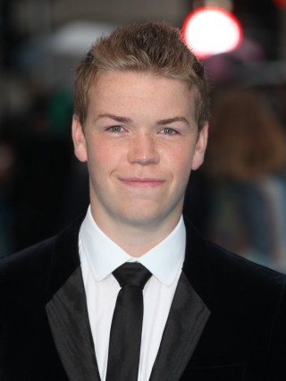 Young man smiling red carpet - a red carpet event free wallpaper