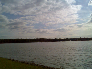 Lake boats clouds grassy shore - danube school free wallpaper