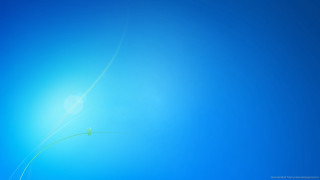 Blue sky green kite sunbeam - single free wallpaper