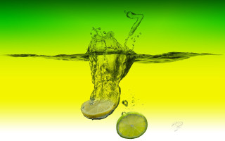 Lime splashing green yellow liquid - a lime free wallpaper