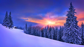 Sunset snowy mountain trees house - a red sky free wallpaper