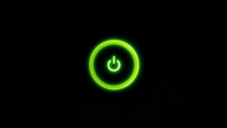 Green glowing button black background 2 - objective abstraction free wallpaper
