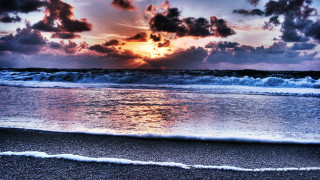 Sunset ocean waves surfer beach - the beach in the foreground free wallpaper