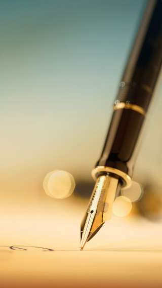 Pen writing paper blurry sky - a tilt shift photo free wallpaper for mobile
