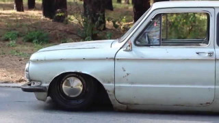 White car parked road forest 2 - a white car free wallpaper