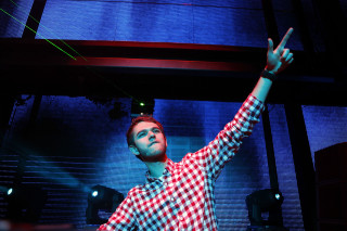 Man checkered shirt hand up - a stage free wallpaper