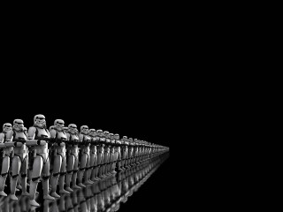 Toy soldiers row black background - a reflection of them free wallpaper