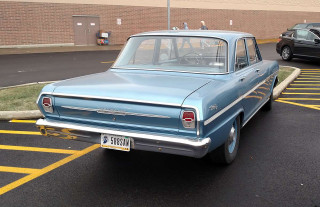 Blue car parking lot building 2 - side profile free wallpaper