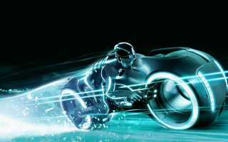 Futuristic motorcycle glowing wheelie man - the bike free wallpaper