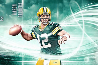 Football player holding ball green 3 - ross free wallpaper