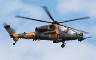 Helicopter flying cloudy blue sky - a helicopter free wallpaper