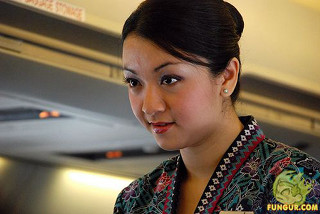 Woman colorful shirt cell phone - full round face free wallpaper