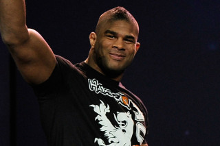 Man holding frisbee fist black - cedric seaut free wallpaper