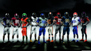 Football players helmeted arms aligned - helmet free wallpaper