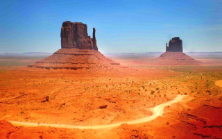 Desert landscape river rocks sky - two large rock free wallpaper