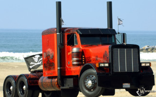 Red truck beach ocean flag - a red truck free wallpaper