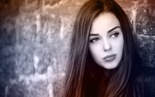 Woman long hair brick wall 2 - a black jacket free wallpaper