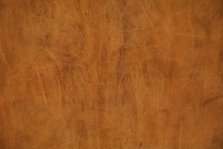 Brown leather texture black border - product photo free wallpaper for desktop