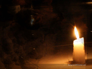 Candle lit dark blurry background - a candle free wallpaper