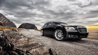 Black car rocky road mountain - dramatic free wallpaper for desktop
