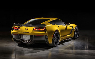 Yellow chevrolet sports car dark 2 - a black background and a spotlight free wallpaper