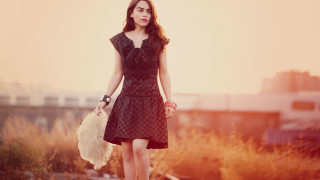 Woman black dress white purse 2 - contemporary free wallpaper