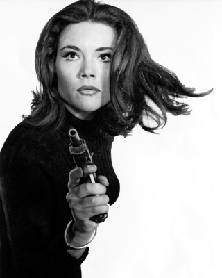 Woman holding gun serious look 3 - her right hand free wallpaper for mobile