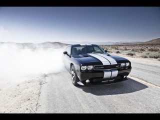 Black white car driving dust - dust free wallpaper