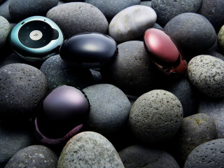Rocks headphones earbuds group top - a pair of headphones free wallpaper