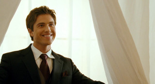 Man smiling suit tie window - a window free wallpaper