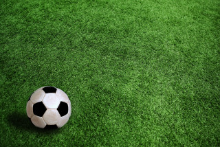 Soccer ball green field black - a soccer ball free wallpaper